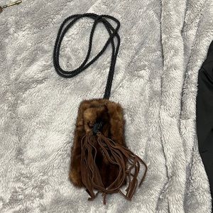 Mink Crossbody Pouch with Rope Strap and Suede Tassels.